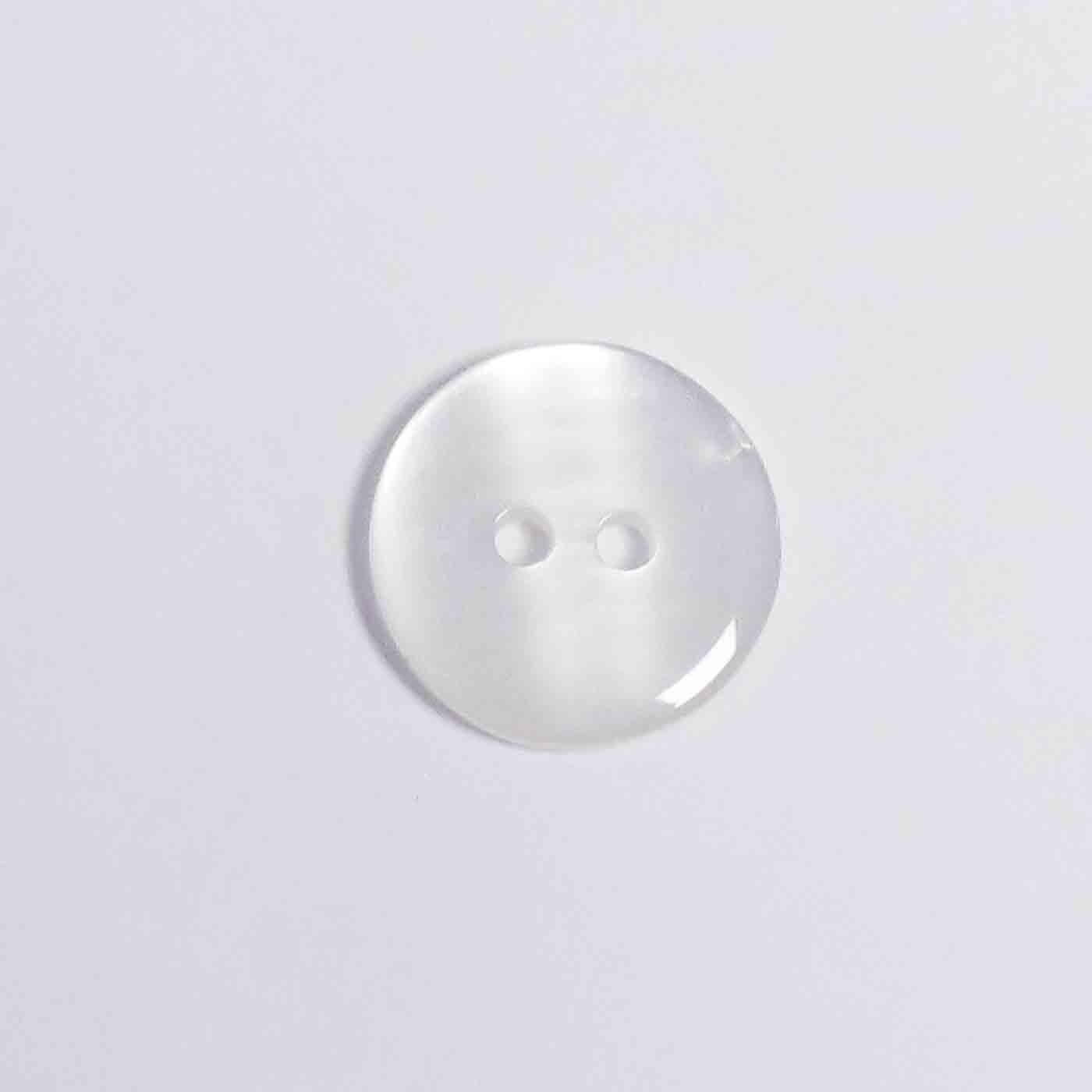 Knapp i plast 18 mm i diameter och med 2 hål.